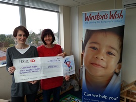 Claire Ward-Dutton presents a cheque to Winston's Wish